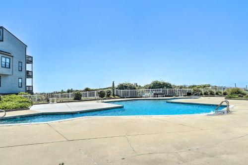 a swimming pool in front of a building at Topsail Beach Oceanfront Oasis with Stunning Views! in North Topsail Beach