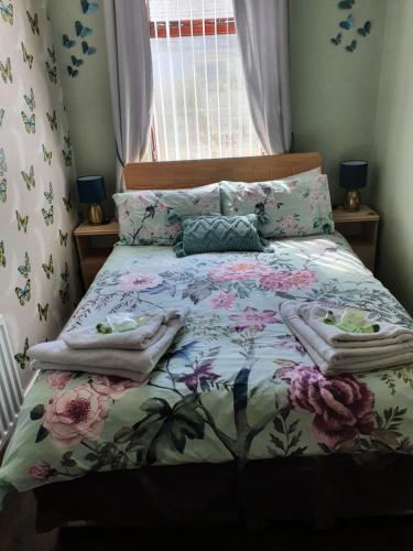 Кровать или кровати в номере Wynnstay Hotel Blackpool