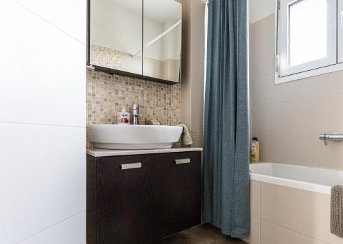 Ένα μπάνιο στο Modern apartment with wonderful view