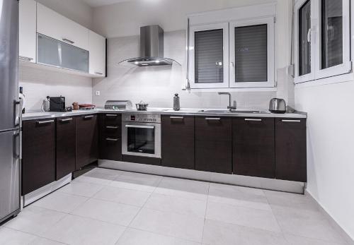 Η κουζίνα ή μικρή κουζίνα στο Modern apartment with wonderful view