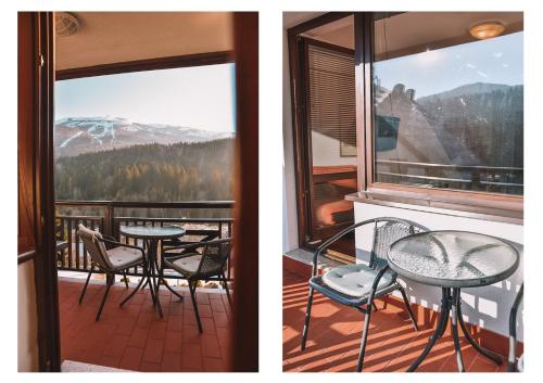 balcón con mesa, sillas y ventana en Apartment Bjelasnica, en Bjelašnica