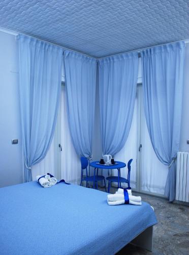 Katil atau katil-katil dalam bilik di Casa Torrese