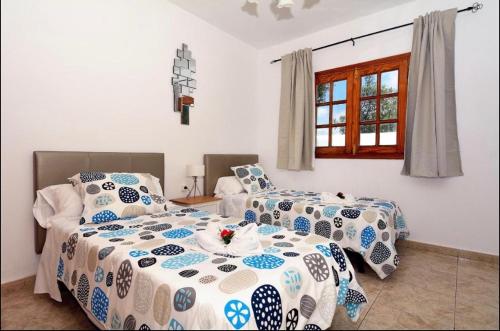Postel nebo postele na pokoji v ubytování Casa Munsoo