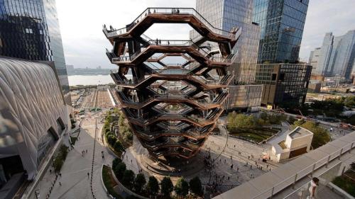 a tall building in the middle of a city at Crowne Plaza HY36 Midtown Manhattan by IHG in New York