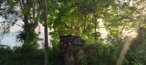 a sign that says we cant get around at Wilton House Oceanview Cabin in Mearnsville