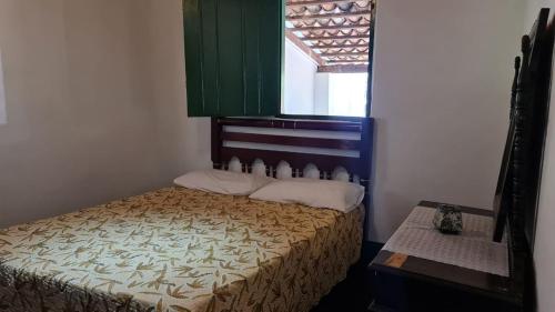 Łóżko lub łóżka w pokoju w obiekcie Chacara bica dágua