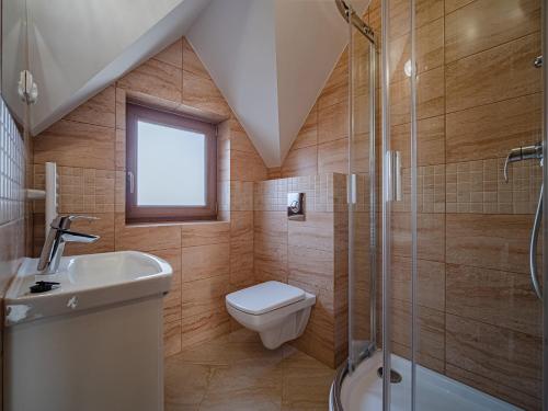 Ένα μπάνιο στο Tatrzańska Kryjówka Premium Chalets Zakopane