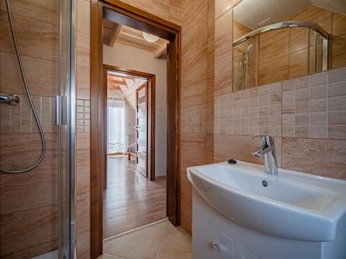 Ένα μπάνιο στο Tatrzańska Kryjówka Premium Chalets Zakopane