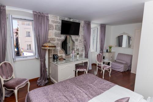 TV a/nebo společenská místnost v ubytování Deluxe Collection Hotel Kastel - Depadanse