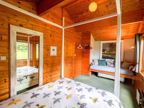Postel nebo postele na pokoji v ubytování Avallon Lodges