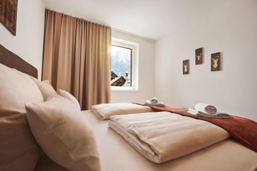 Postel nebo postele na pokoji v ubytování die Tauplitz Lodges - Alm Lodge A2 by AA Holiday Homes