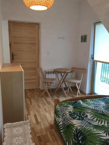 Postel nebo postele na pokoji v ubytování Chata Bieszczady