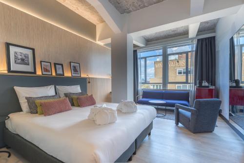 Postel nebo postele na pokoji v ubytování Postillion Hotel WTC Rotterdam