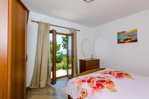 Posteľ alebo postele v izbe v ubytovaní Carpe Diem Apartments