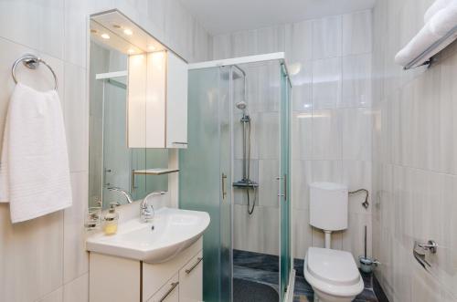 Koupelna v ubytování Carpe Diem Apartments