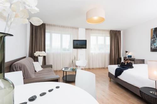 Кът за сядане в Ténéo Apparthotel Talence Arthena