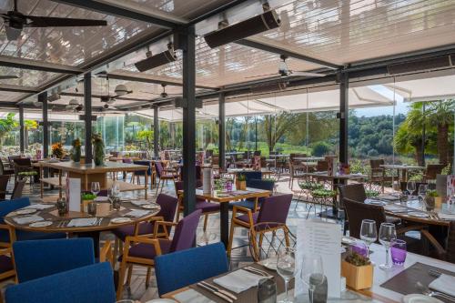 Restaurant ou autre lieu de restauration dans l'établissement Barceló Montecastillo Golf