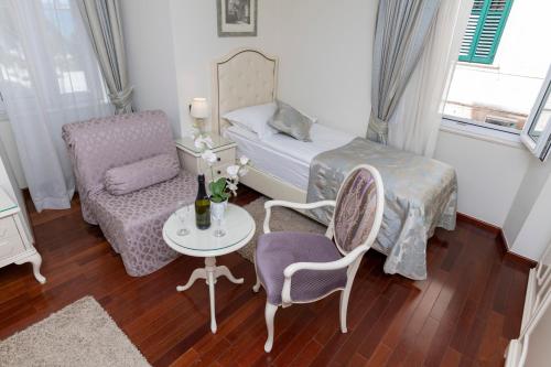 Postel nebo postele na pokoji v ubytování Deluxe Collection Hotel Kastel - Depadanse