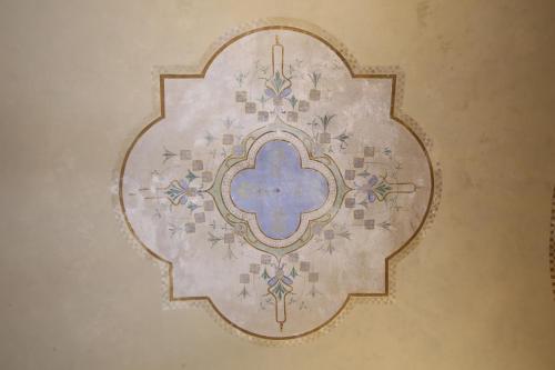 a drawing of a tile on a wall at 1940 Luxury Accommodations by Wonderful Italy in Ostuni