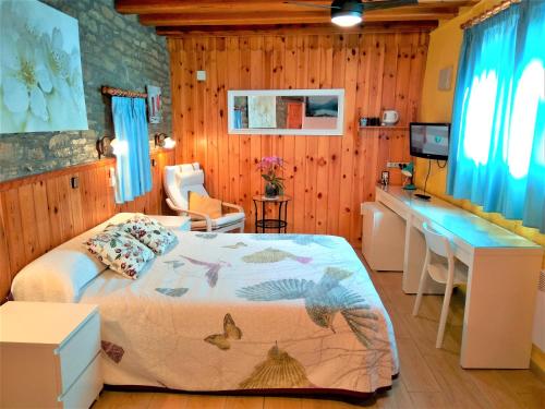 Ένα ή περισσότερα κρεβάτια σε δωμάτιο στο Casa Rural La Era