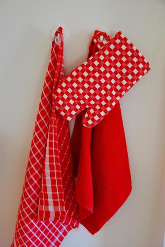 three ties are hanging on a wall at Bed and Breakfast de Meule Montfort in Montfort