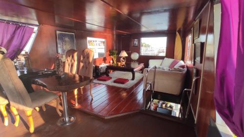 an aerial view of a living room and dining room at Sabai Sabai Liveaboard Bangkok in Bangkok