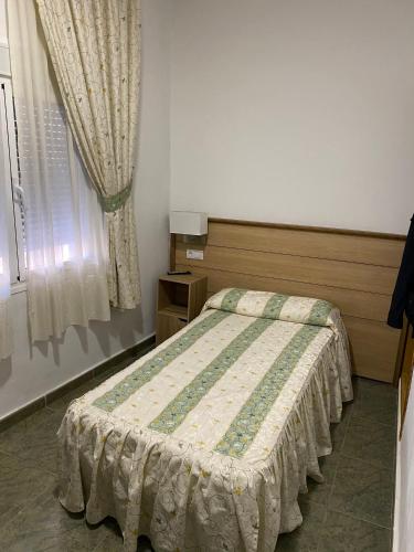 Postel nebo postele na pokoji v ubytování La Escapada