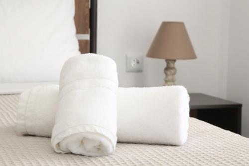 Ένα ή περισσότερα κρεβάτια σε δωμάτιο στο Lampias apartments
