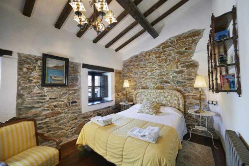 מיטה או מיטות בחדר ב-Casa La Palomba