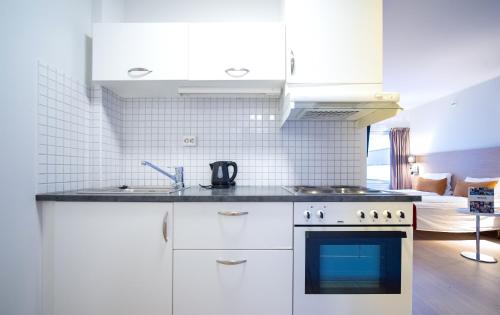 Dapur atau dapur kecil di Enter City Hotel