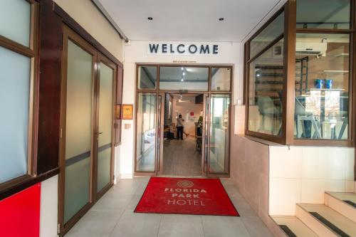 a store hallway with a red rug on the floor at Florida Park Hotel, Florida Road in Durban