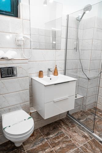 Un baño de Puzzle Apartaments&Studios