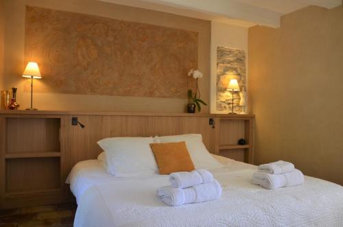 Cama ou camas em um quarto em Le Jas des Parpaillous