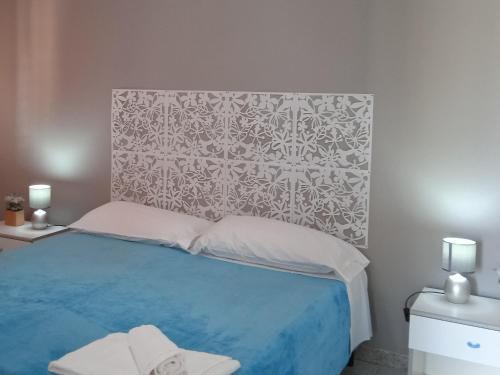 Ένα ή περισσότερα κρεβάτια σε δωμάτιο στο Guest House Oleandro