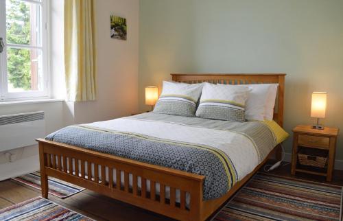 Ένα ή περισσότερα κρεβάτια σε δωμάτιο στο Champ De Foire