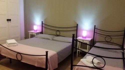 A bed or beds in a room at B&B Salvatore Lido di Noto