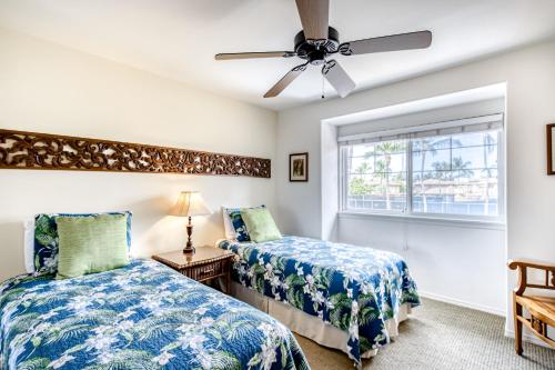Llit o llits en una habitació de Waikoloa Colony Villas 1703