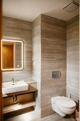Koupelna v ubytování Tagore Spa Aparthotel
