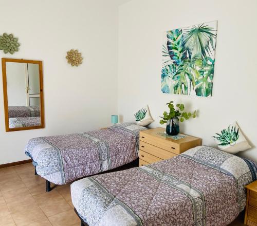 Кровать или кровати в номере Lakes&Hills Apartments