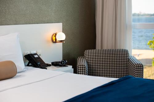 Píer Vitória Hotelにあるベッド