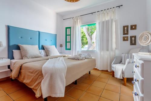 Postel nebo postele na pokoji v ubytování Casa Jardín
