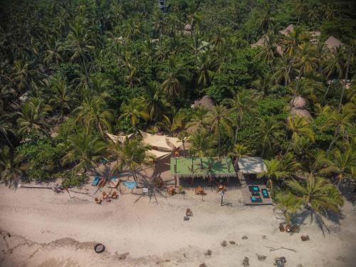an aerial view of a resort on a beach at Cayena by Masaya Collection in Guachaca