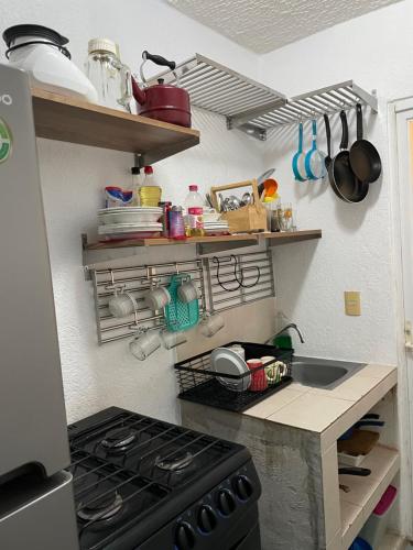 Dapur atau dapur kecil di Raya apartment