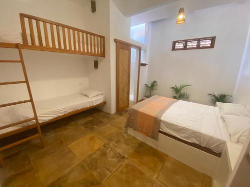 Dviaukštė lova arba lovos apgyvendinimo įstaigoje Navegantes Praia