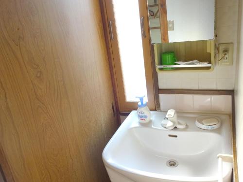 Bilik mandi di Imazato Ryokan