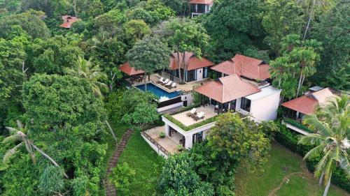 an aerial view of a house in the forest at Pimalai Resort & Spa in Ko Lanta
