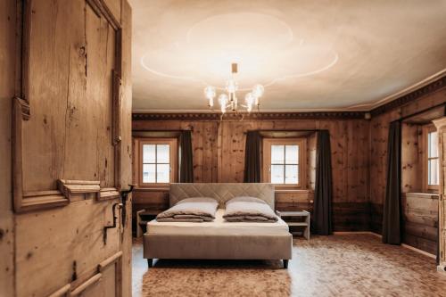 Una cama o camas en una habitación de Ban Hilba