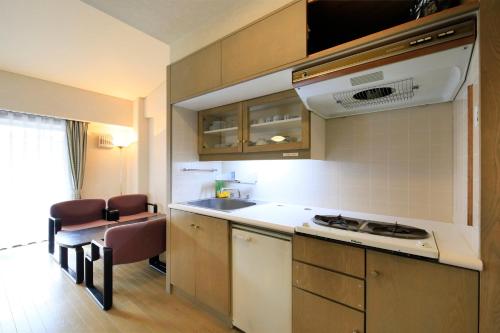 Η κουζίνα ή μικρή κουζίνα στο Kishutetsudo Karuizawa Hotel