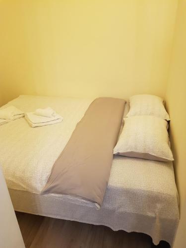 Postel nebo postele na pokoji v ubytování Apartament 1 Central