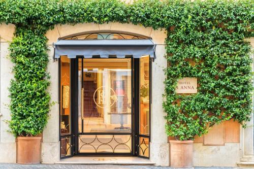 an entrance to a building with plants on it at Hotel S. Anna in Rome